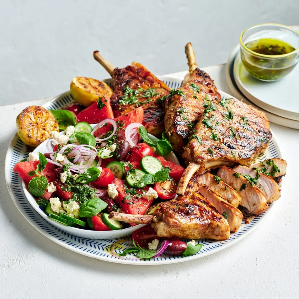 oregano and honey pork cutlets with watermelon salad image