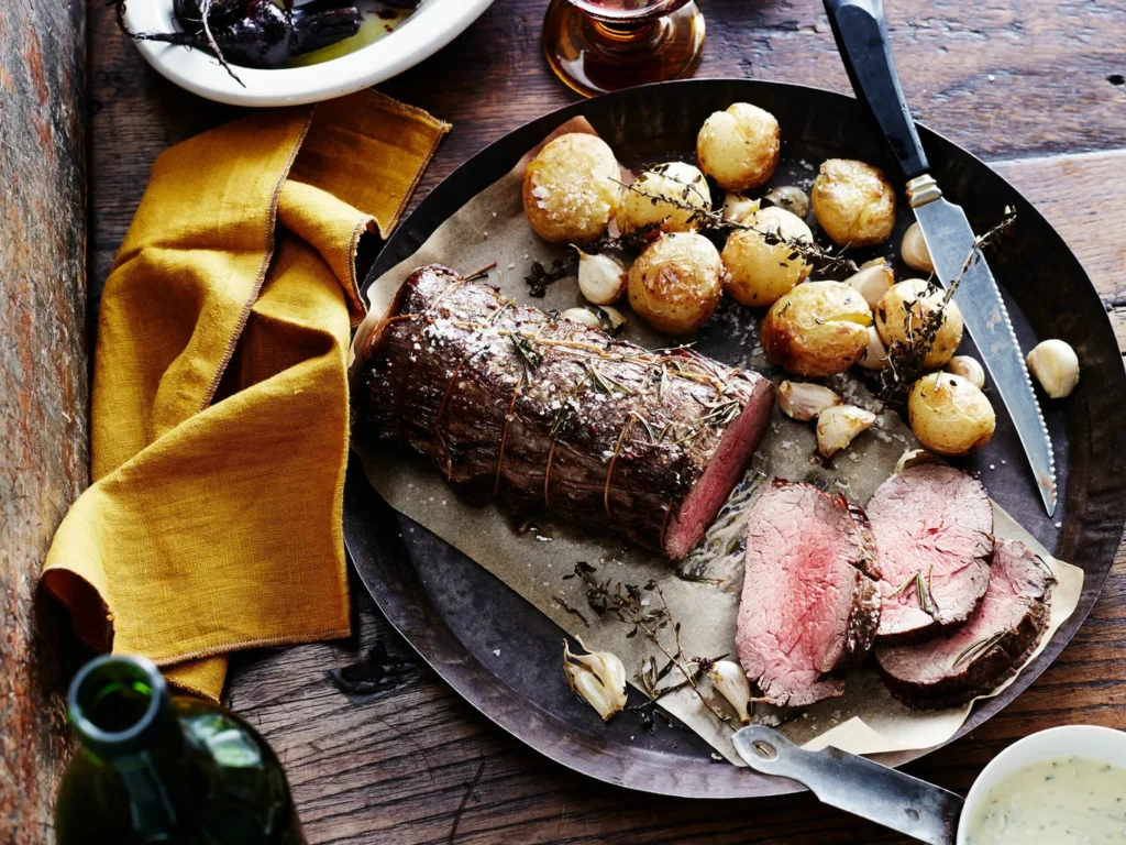 whole roasted scotch fillet with crispy potatoes image