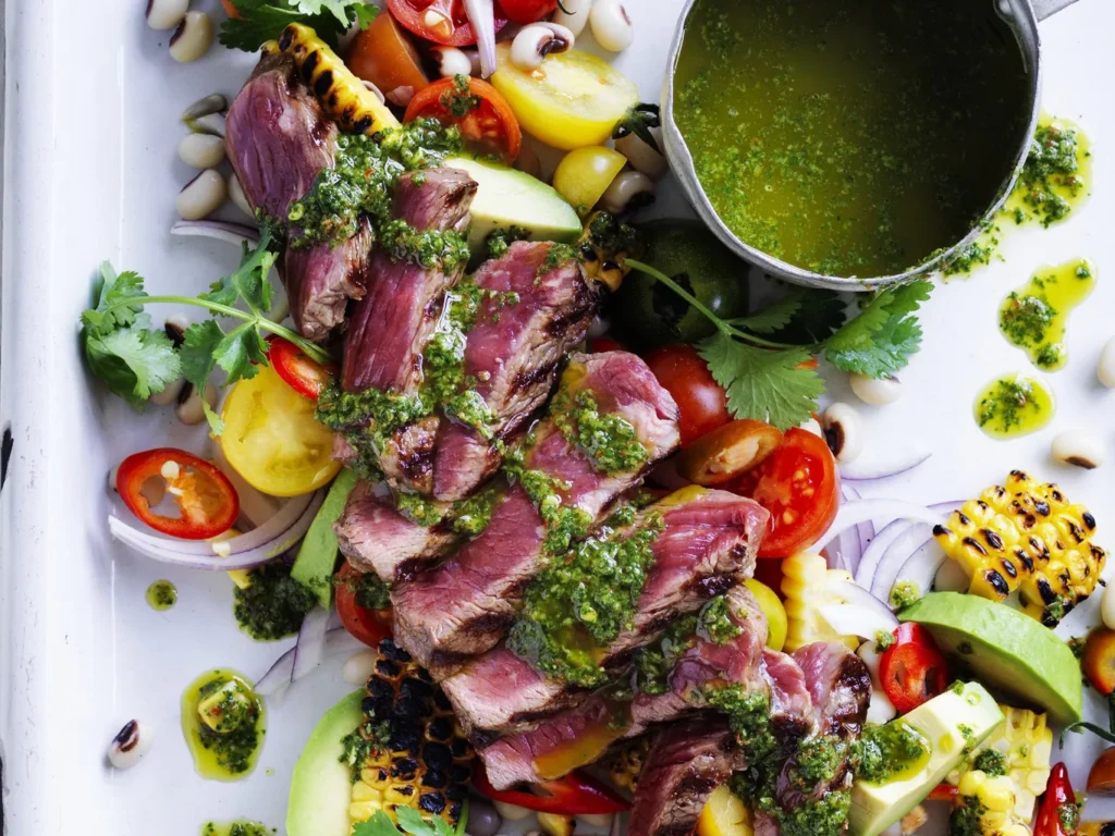 warm beef salad with black eyed peas corn and chimichurri